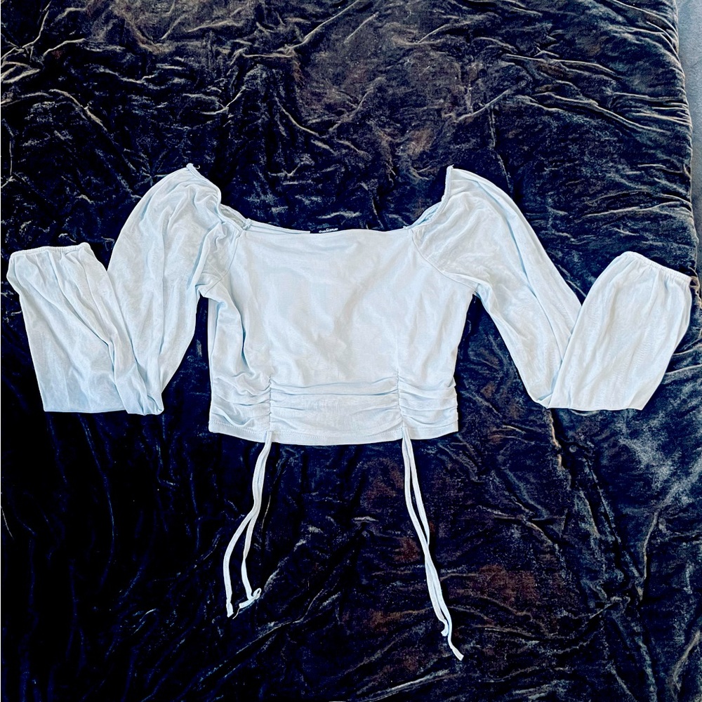 Nice Blue off the shoulder or not too, transparent sleeves, worn once. Sky blue.
